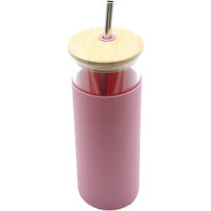 A drink bottle in a soft pink colour with a bamboo lid and metal straw, featuring a clear body.