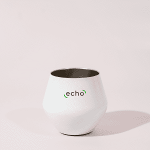 A white, detachable wine glass with a sleek design and a logo on the front.