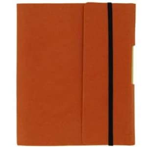 An orange small tuck journal book with a black elastic band, featuring a textured cover and a pocket.