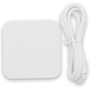 A white wireless charging dock with a matching cable. The dock has a smooth, square design.