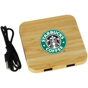 A bamboo charging dock in a square shape with a cable, featuring a logo on the surface.