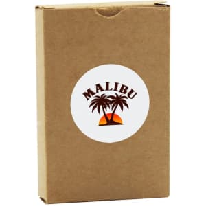 A brown cardboard box containing eco-friendly playing cards, featuring a logo with palm trees and a sunset design.