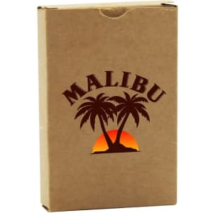 A tan cardboard box containing eco-friendly playing cards with a logo featuring palm trees and a sunset.