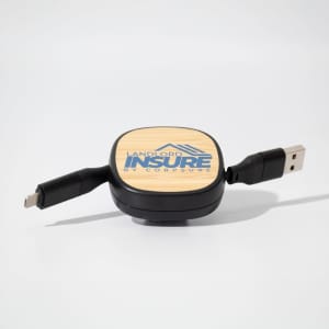 A fast charging cable in black with a wooden textured centre and two connectors, featuring a logo.