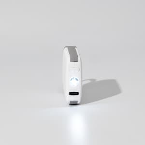 A white mini power bank with a grey accent and a built-in light, featuring a logo on the side.
