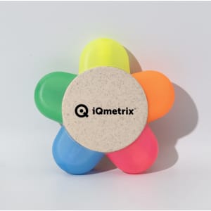 A flower-shaped highlighter featuring bright shades of pink, orange, yellow, and blue, with a central logo.