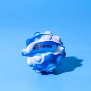 A blue and white stress ball resembling a popper, featuring a logo.