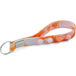 An orange and white popper stress reliever keychain with multiple popping buttons and a metal keyring.