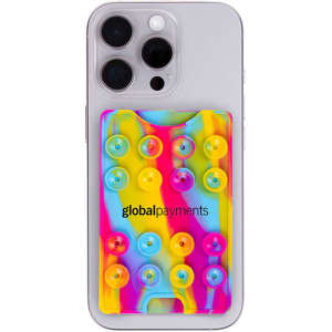 A colourful suction phone wallet featuring a mix of pink, yellow, and blue hues, attached to a smartphone.