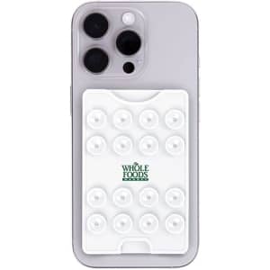 A white suction phone wallet with multiple suction cups on its surface, attached to a smartphone.