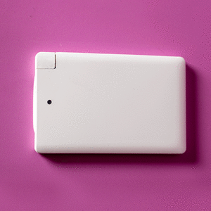 A white ultra slim power bank on a pink background, featuring a small logo.