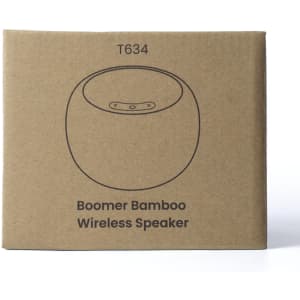 A brown cardboard box featuring a simple illustration of a round bamboo wireless speaker with a logo.