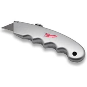 A silver utility knife with a textured handle and a retractable blade, featuring a logo on the handle.