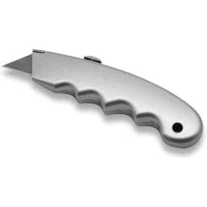A silver handheld cutter with a serrated edge and a textured grip for easy handling. It has a circular hole for keyring attachment.