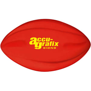A red football with a smooth surface and a logo displayed on it.