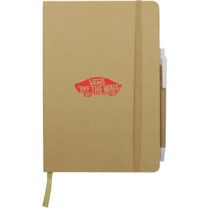 A brown A5 notebook with an elastic band, pen holder, and a logo on the front.