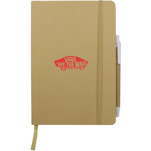 A tan A5 notebook with a logo and an attached pen. It features an elastic band and a ribbon bookmark.