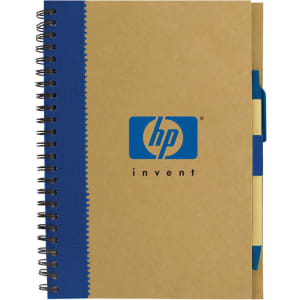 A recycled paper notebook with a brown cover, blue spiral binding, and a matching pen attached. Features a logo.