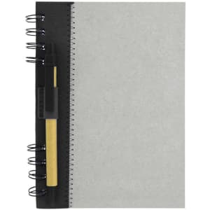 A recycled journal book in grey with a black spiral binding and a pen attached. It features branding on the cover.
