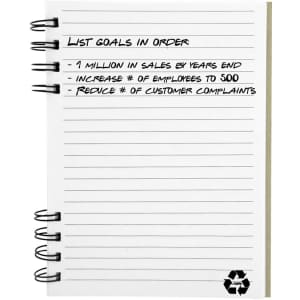 A recycled journal book with a spiral binding and lined pages, featuring a small recycling symbol.