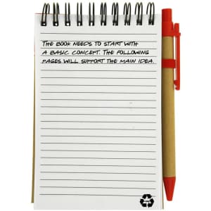 A recycled jotter pad with a spiral binding and a red pen, featuring blank lined pages for notes.