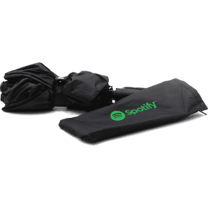 A foldable black umbrella with a black carrying sleeve featuring a logo.