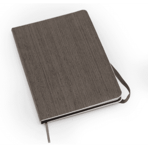 A brown eco notebook with a textured cover and a matching ribbon bookmark. It also features a logo.