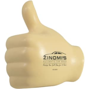 A yellow thumb-shaped stress reliever with a branded logo on its side.
