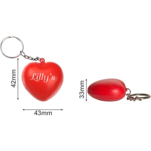 A red heart-shaped stress reliever with a keyring attached, featuring white branding.