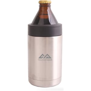 A stainless steel stubby holder in silver with a black rubber top, holding a brown glass bottle.