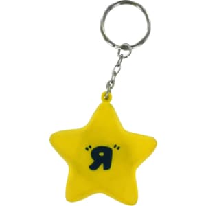 A yellow star-shaped stress reliever attached to a keyring, featuring a small symbol in black.