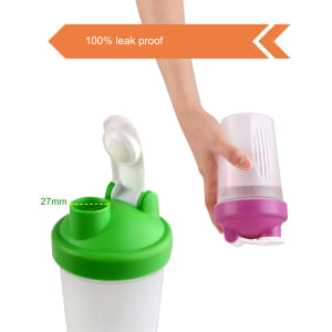 A drink bottle with a green and purple lid, featuring a leak-proof design and a hand holding it for demonstration.
