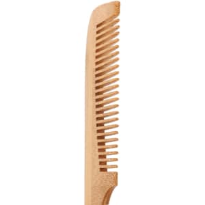 A natural bamboo comb with a handle, featuring alternating wide and narrow teeth, in a light brown colour.