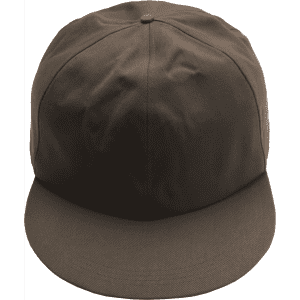 A giant brown baseball cap with a flat brim and structured crown, featuring a logo on the front.
