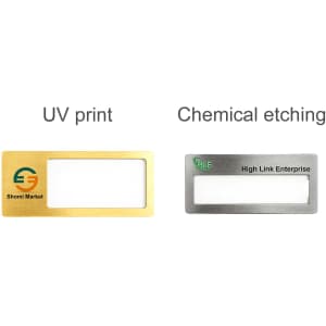 A metal name badge featuring a gold finish on the left and a silver finish on the right, with a branding logo.