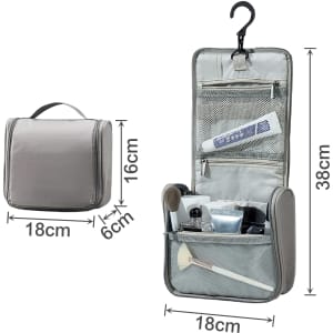 A grey hanging travel toiletry bag with compartments and a hook for easy access. Contains various toiletry items.