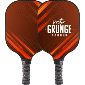 A set of two pickleball paddles in vibrant orange and black, featuring a textured design and grips.