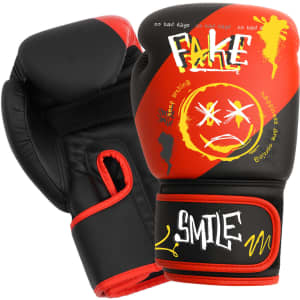 Adult training boxing gloves in black and red with graffiti-style artwork, including a face design and text elements.
