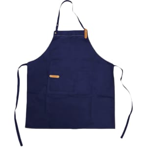 A navy blue poly-cotton canvas full bib apron with neck strap and a pocket, featuring a logo.