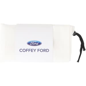 A white cotton mesh produce bag with a black drawstring and a branded label.
