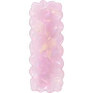 A wavy rectangle iridescent hair clip in soft pink hues with a shiny, translucent finish. It features a logo.