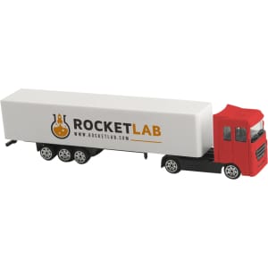 A red and black toy truck with a white trailer featuring a logo.
