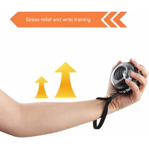 A black wrist ball with a strap in a hand, featuring a logo, designed for stress relief and wrist training.