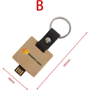 An eco-friendly mini flash drive keychain in a beige and black design with a circular metal keyring.