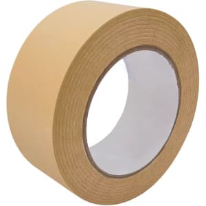 A roll of self-adhesive kraft paper tape in a natural brown colour with a white interior core and no visible branding.