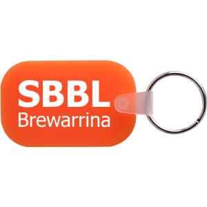 An orange oblong keyring featuring a circular silver keychain attachment and a logo.