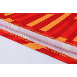 A vibrant red and orange polyester micro mesh fabric with a striped pattern, showcasing the shirt’s long sleeves and stitching.