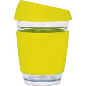 A reusable glass coffee cup in bright yellow, featuring a silicone sleeve and an angled lid, with a logo.