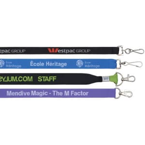 Four woven lanyards in black, blue, green, and purple, each with clips and featuring various logos.
