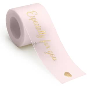 A roll of pink organza ribbon with gold text reading "Especially for you" and a small heart symbol.
